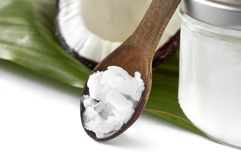 Close-up of coconut oil on the wooden spoon