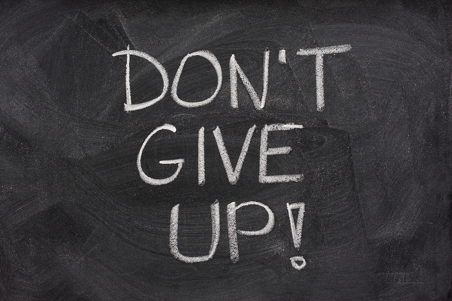 don't give up phrase on blackboard